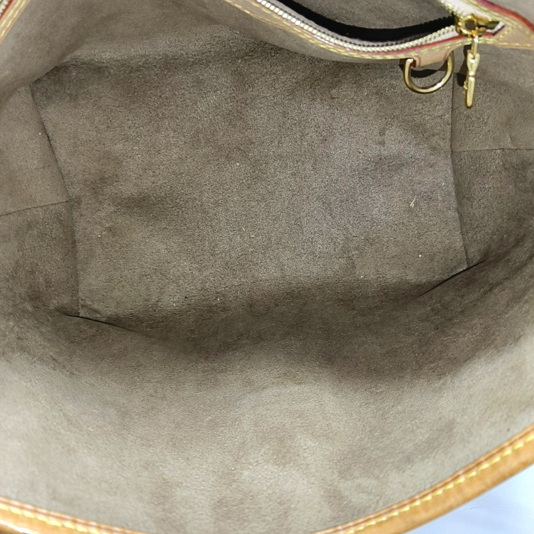 Authenticated pre-owned  LV × TM Annie Medium Monogram Coated Canvas Black - Shoulder Bag at Looply