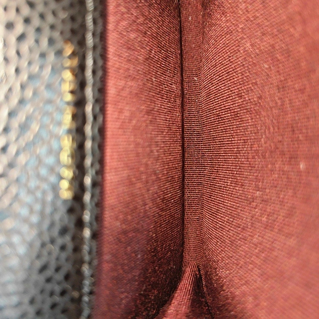 Authenticated pre-owned  Classic Flap Quilted Grained Calfskin Black - Clutch at Looply