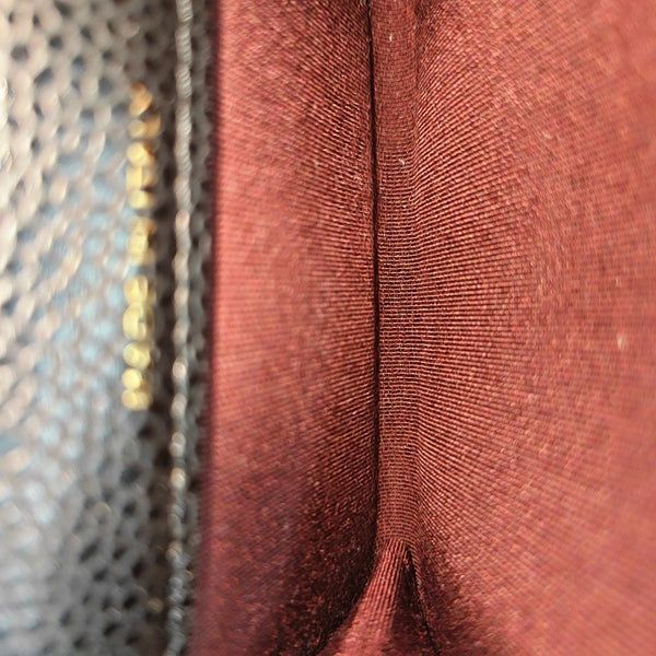 Authenticated pre-owned  Classic Flap Quilted Grained Calfskin Black - Clutch at Looply