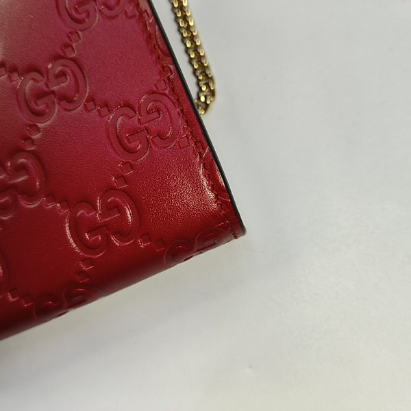 Authenticated pre-owned  Padlock Monogram Calfskin Red - Top Handle Bag at Looply