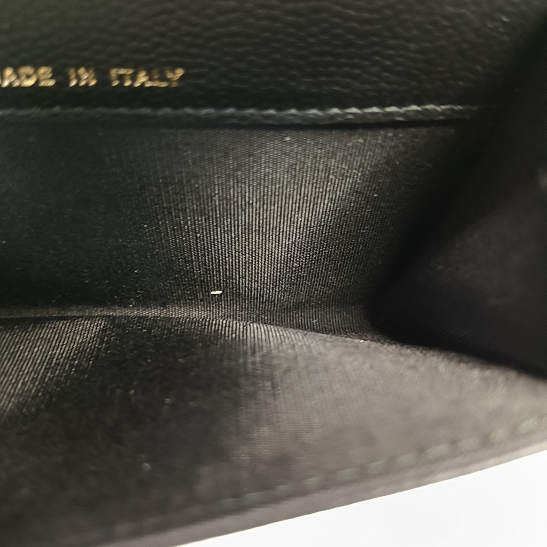 Authenticated pre-owned  Boy Chanel Quilted Grained Calfskin Black Card Holder - Card Holder at Looply