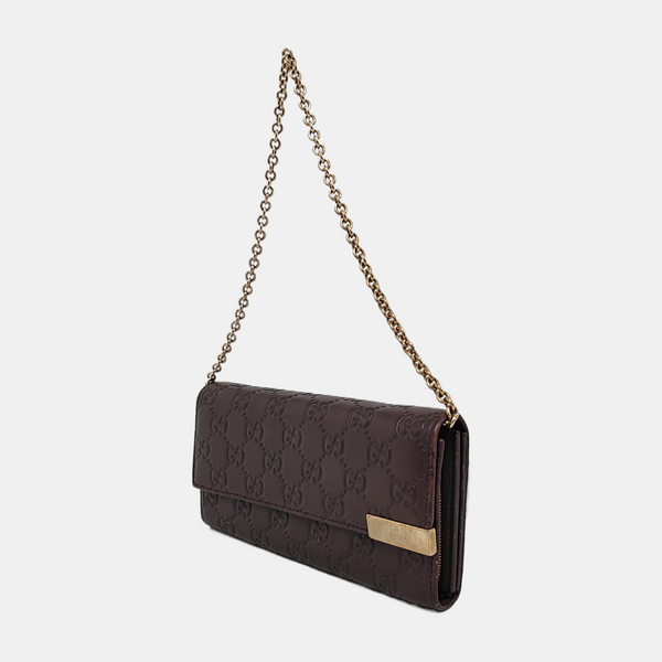 Authenticated pre-owned  Microguccissima Monogram Calfskin Brown - Top Handle Bag at Looply