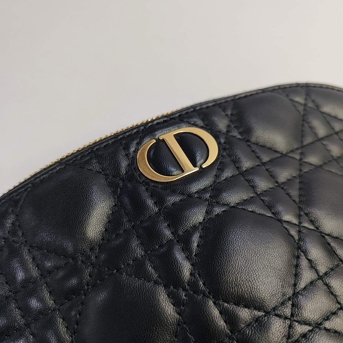 Authenticated pre-owned  Dior Caro Lambskin Black - Clutch at Looply