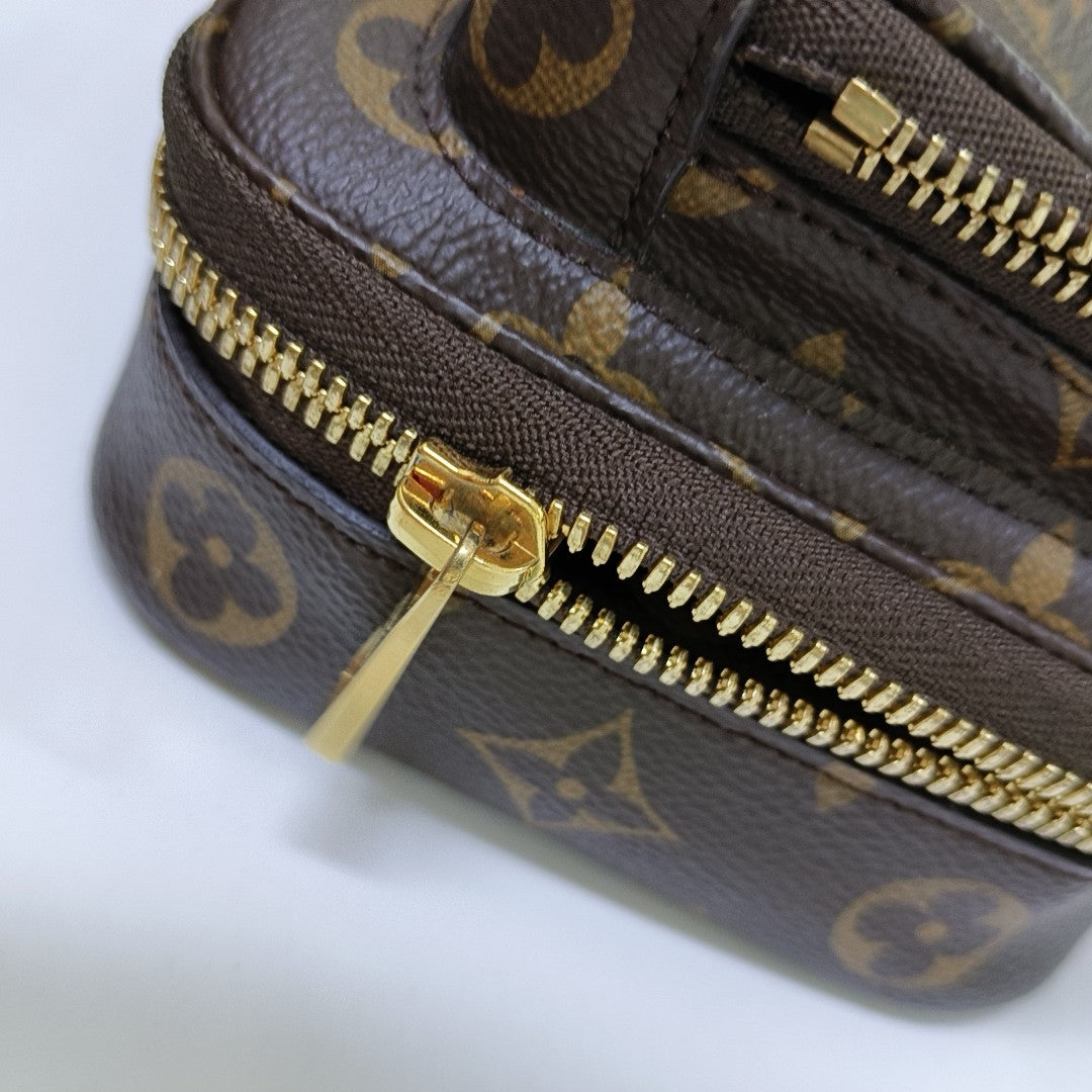 UTILITY Monogram Coated Canvas Brown
