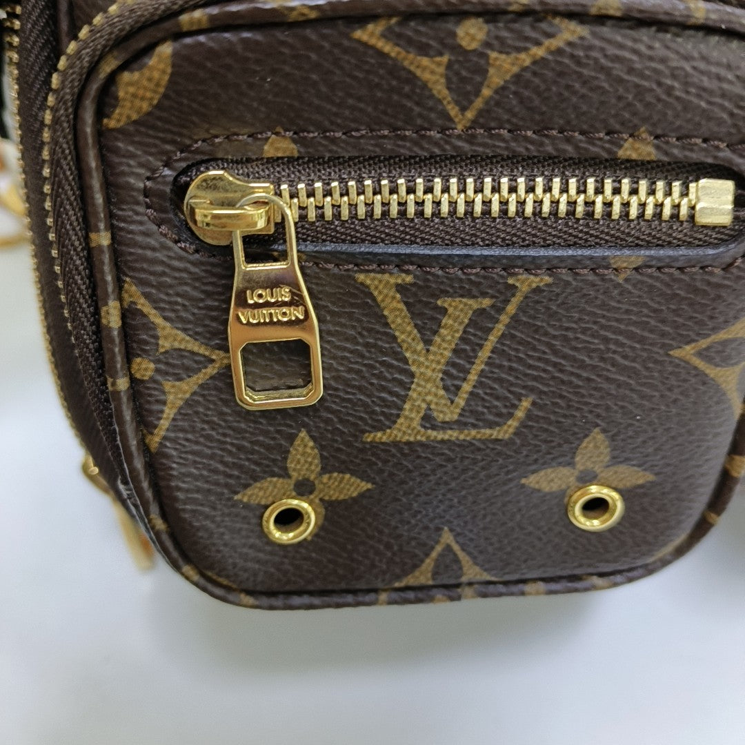 UTILITY Monogram Coated Canvas Brown