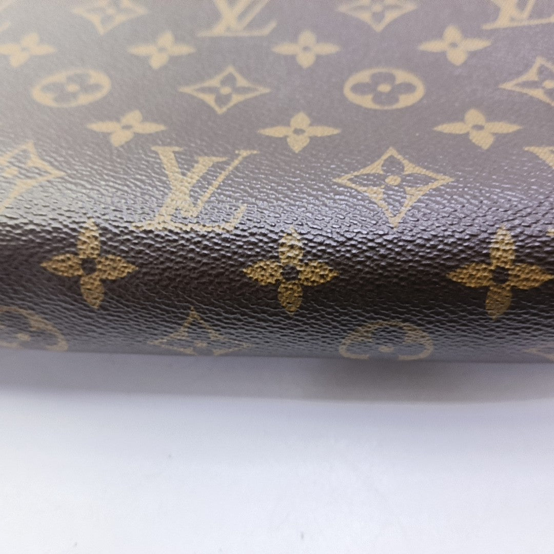 TOILET POCKET 26 Monogram Coated Canvas Brown
