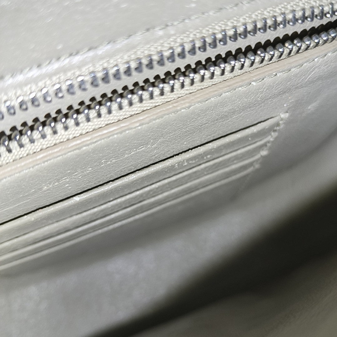 TROTTEUR Small Calfskin Gray