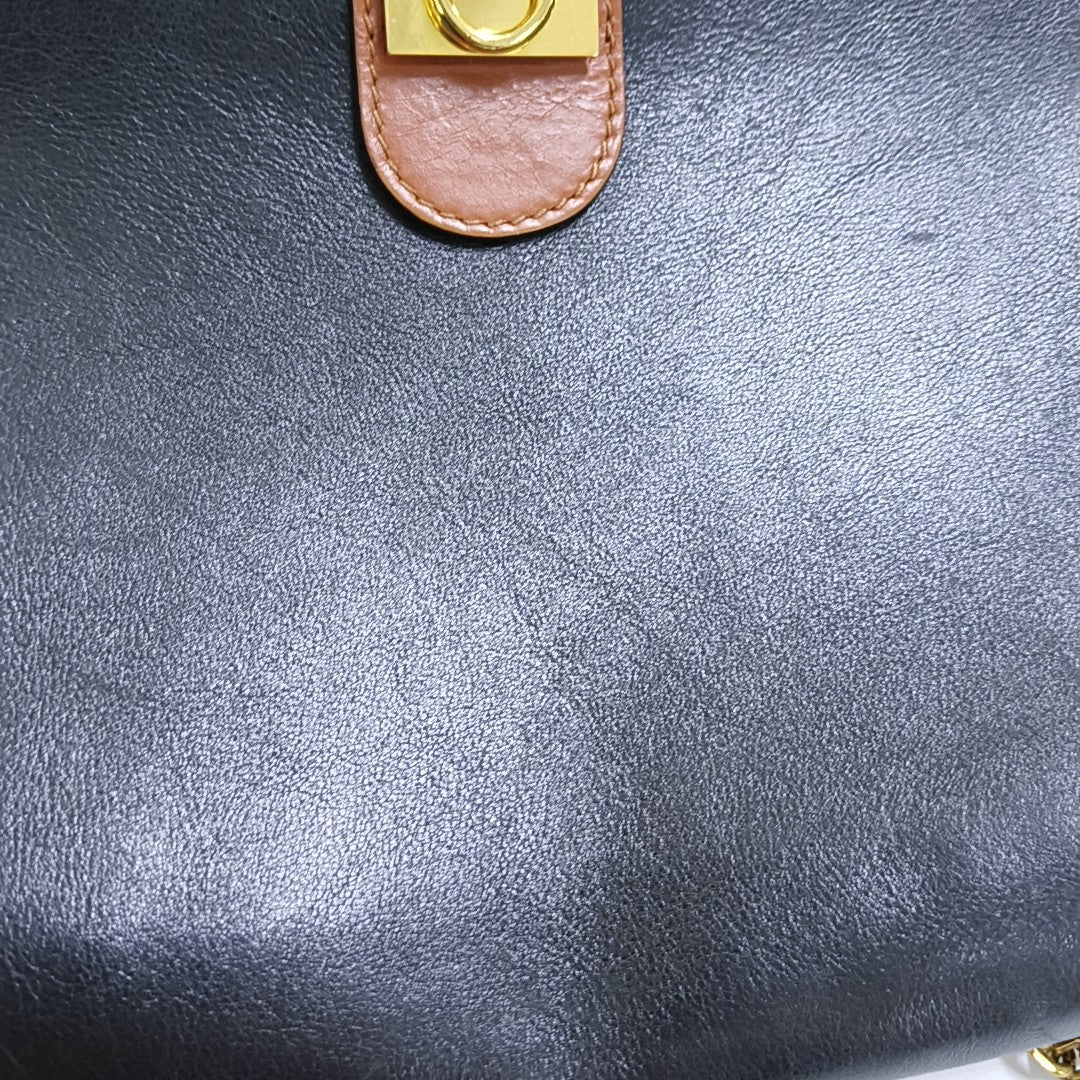 MACADAM CLUTCHES Coated Canvas Black