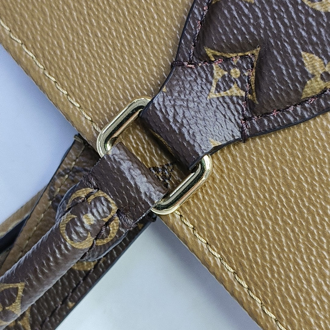 Authenticated pre-owned  Onthego GM Monogram Coated Canvas Brown - Shoulder Bag at Looply