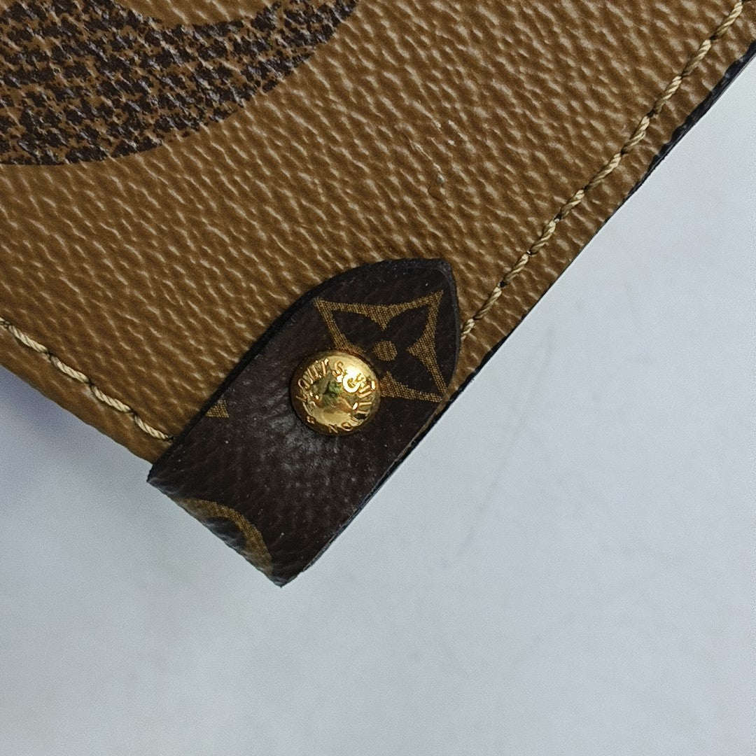 Authenticated pre-owned  Onthego GM Monogram Coated Canvas Brown - Shoulder Bag at Looply