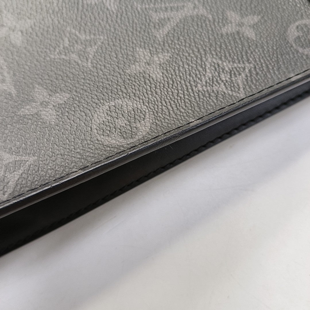 Pochette Voyag MM Monogram Coated Canvas Black