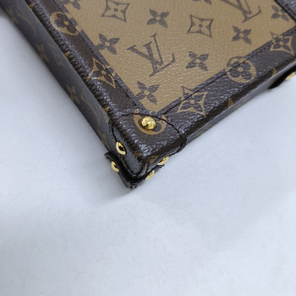 TRUNK Monogram Coated Canvas Brown
