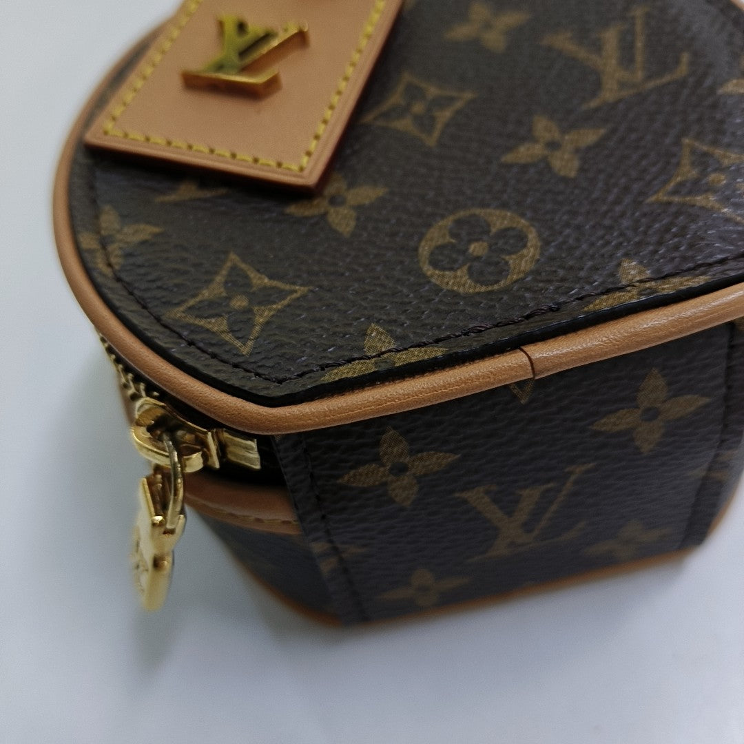 BOITE CHAPEAU Monogram Coated Canvas Brown