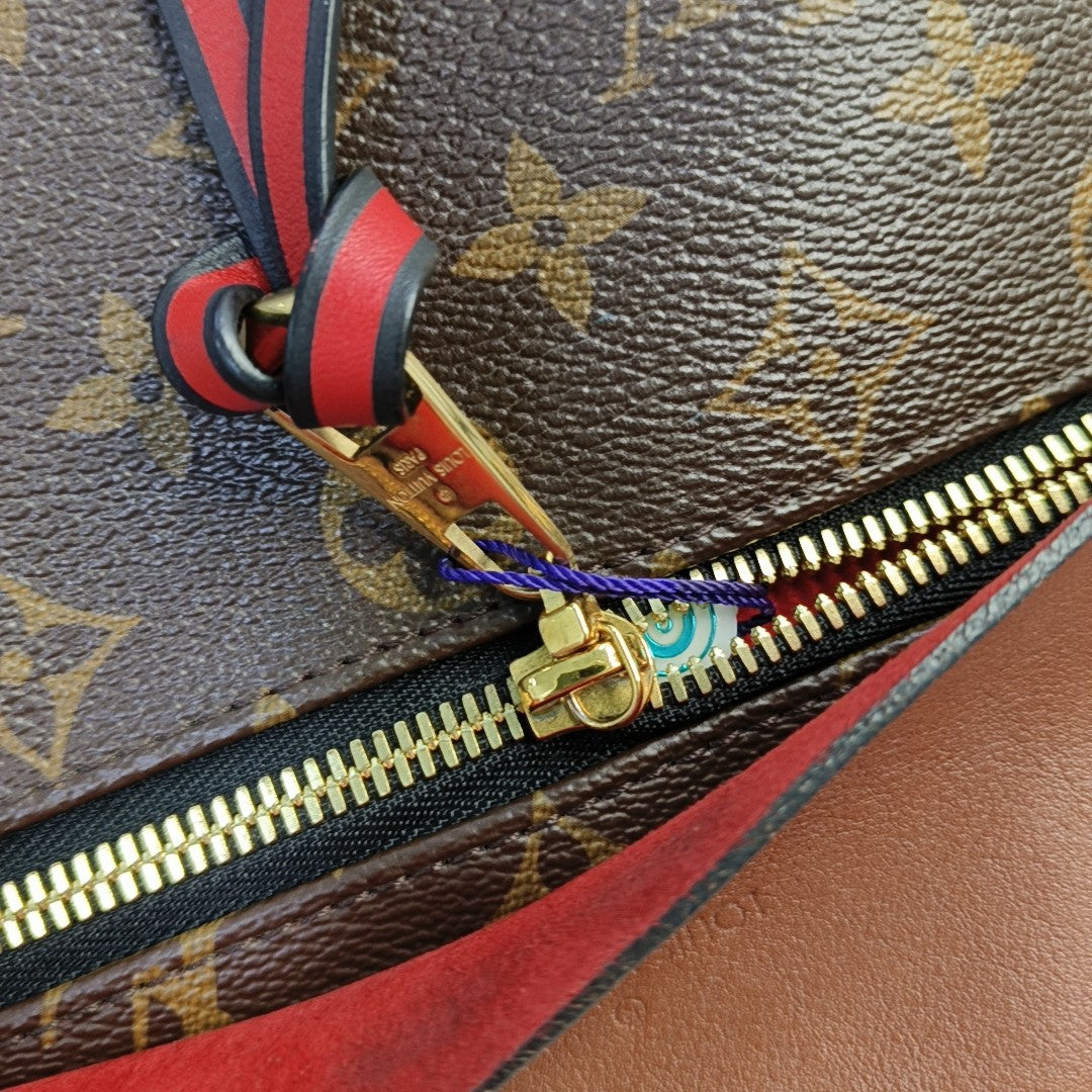 TUILERIES Monogram Coated Canvas Brown
