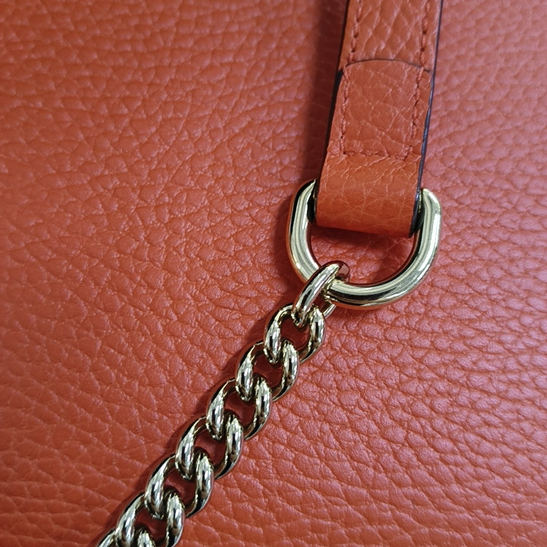 Authenticated pre-owned  Interlocking G Large Calfskin Orange - Crossbody Bag at Looply