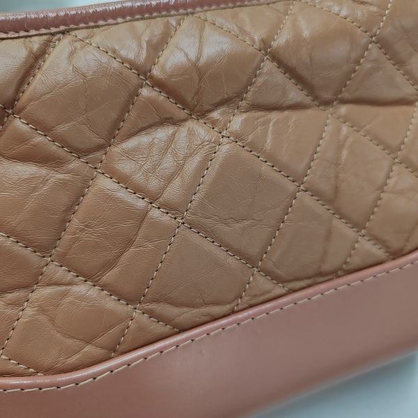 Authenticated pre-owned  Gabrielle Small Quilted Calfskin Beige - Crossbody Bag at Looply