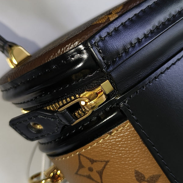 CANNES PM Monogram Coated Canvas Brown