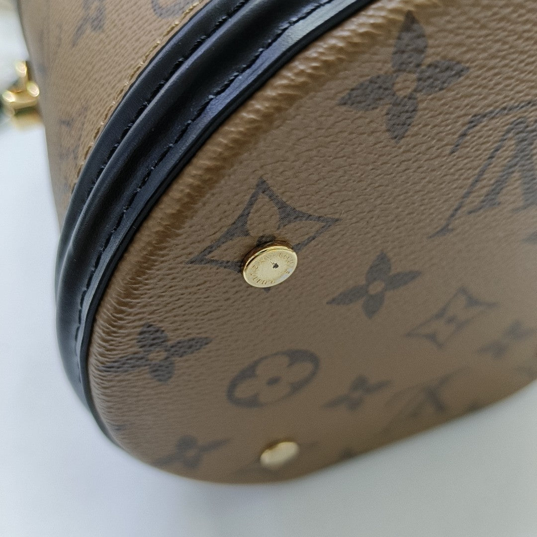 CANNES PM Monogram Coated Canvas Brown