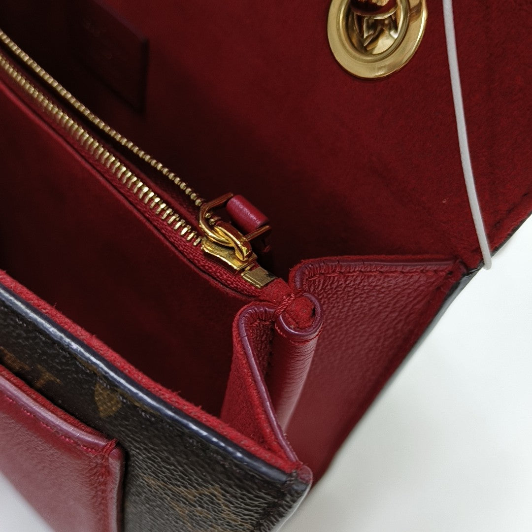 VICTOIRE Monogram Coated Canvas Brown