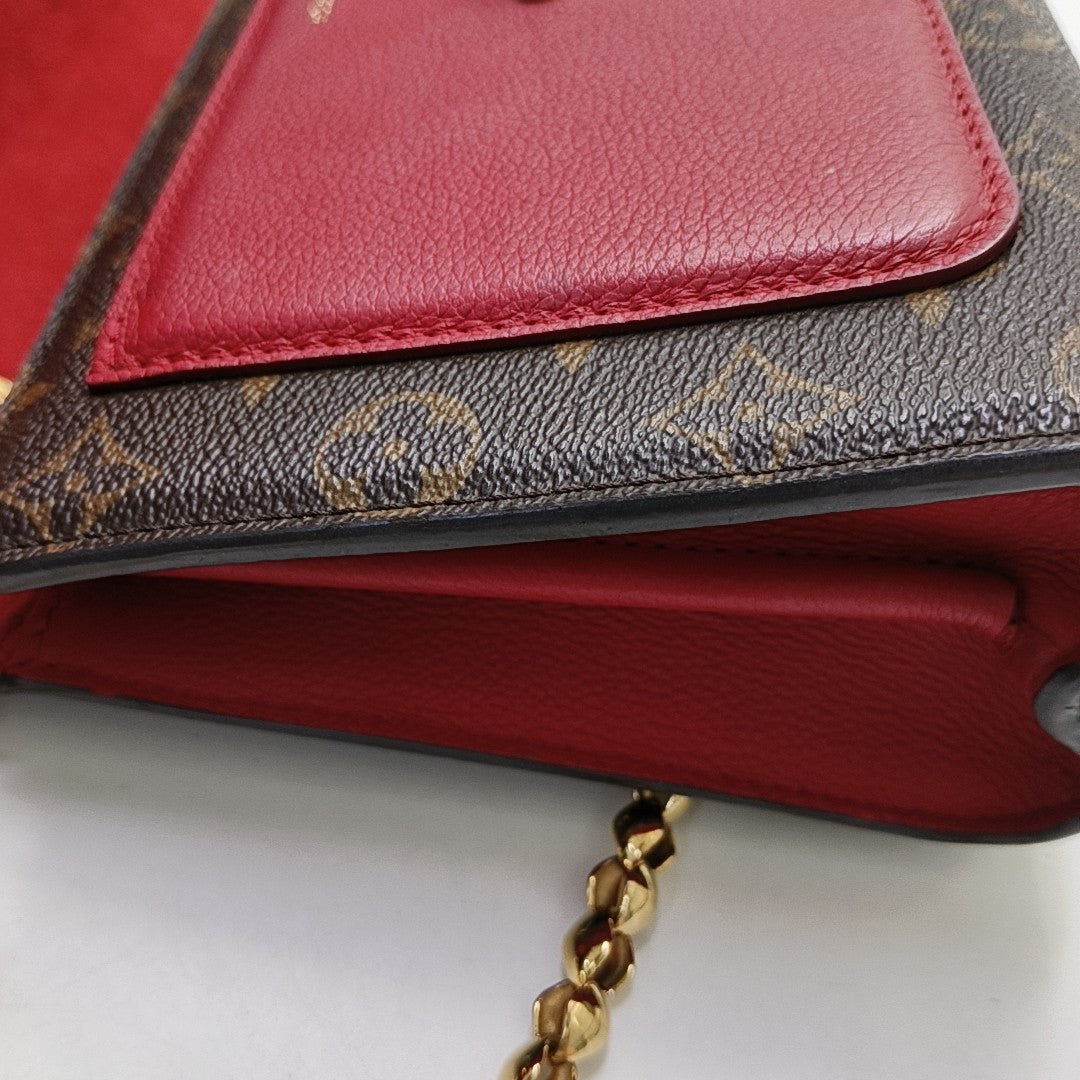 VICTOIRE Monogram Coated Canvas Brown