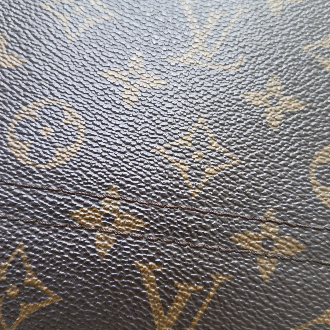 VICTOIRE Monogram Coated Canvas Brown