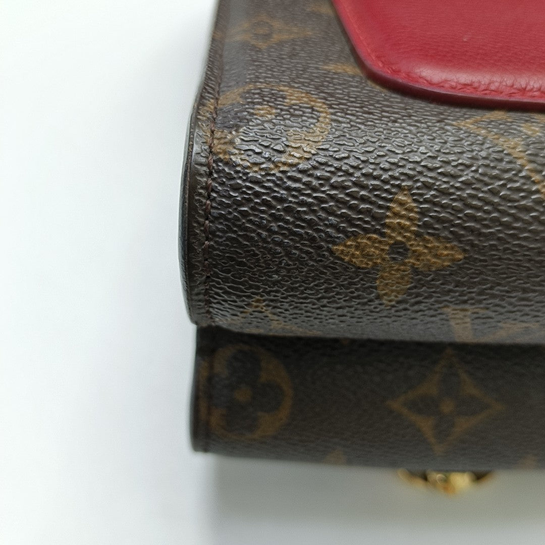 VICTOIRE Monogram Coated Canvas Brown