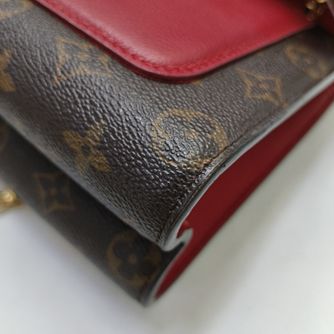VICTOIRE Monogram Coated Canvas Brown