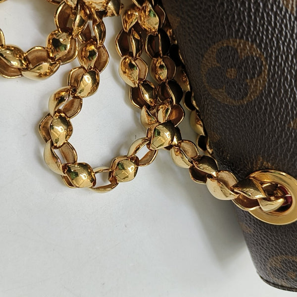 VICTOIRE Monogram Coated Canvas Brown