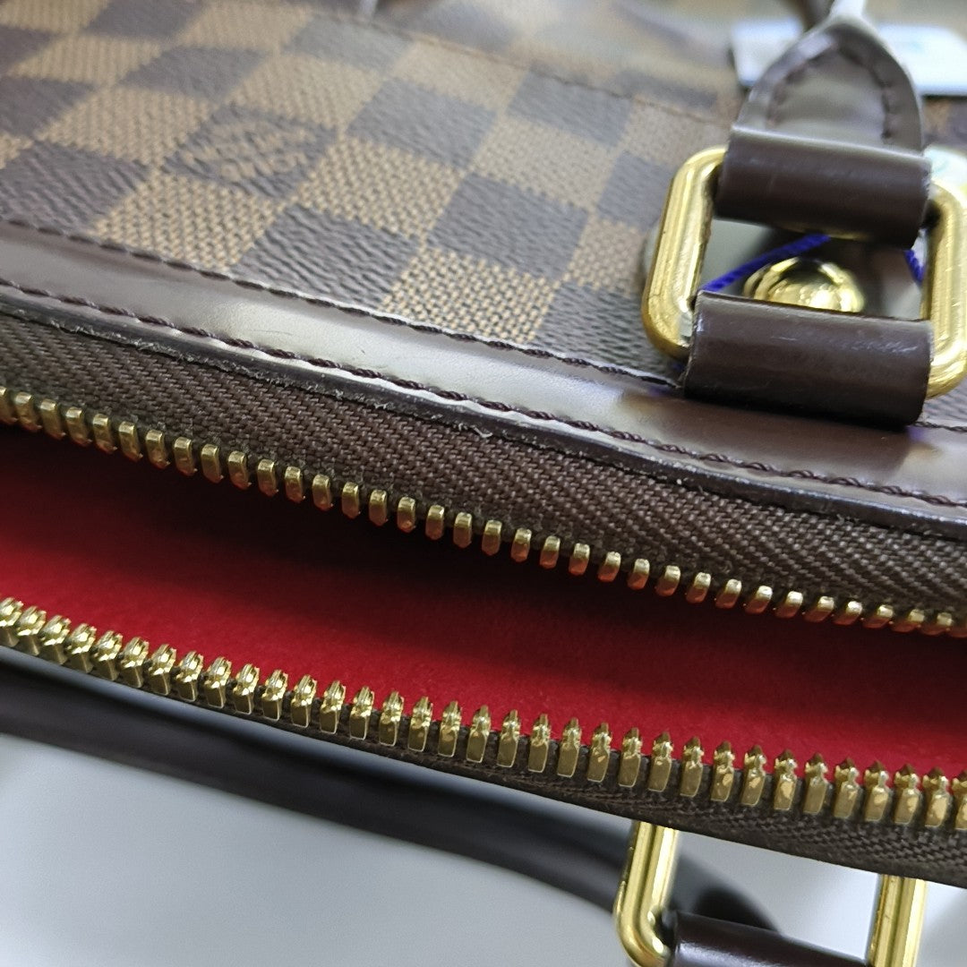 TREVI PM Damier Ebene Coated Canvas Brown