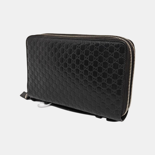Authenticated pre-owned  Microguccissima Monogram Calfskin Black - Clutch at Looply