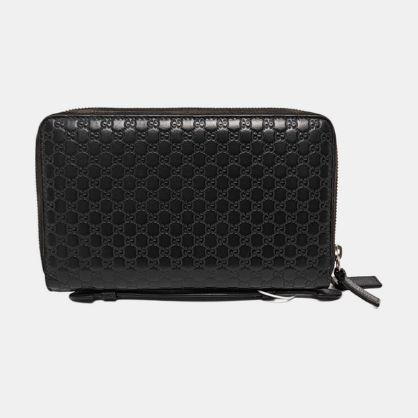 Authenticated pre-owned  Microguccissima Monogram Calfskin Black - Clutch at Looply