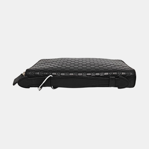 Authenticated pre-owned  Microguccissima Monogram Calfskin Black - Clutch at Looply