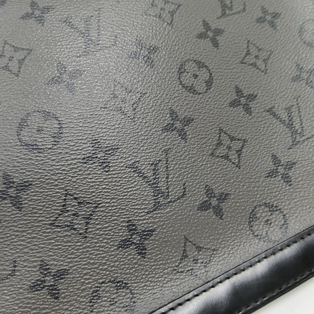 Pochette Voyag MM Monogram Coated Canvas Gray