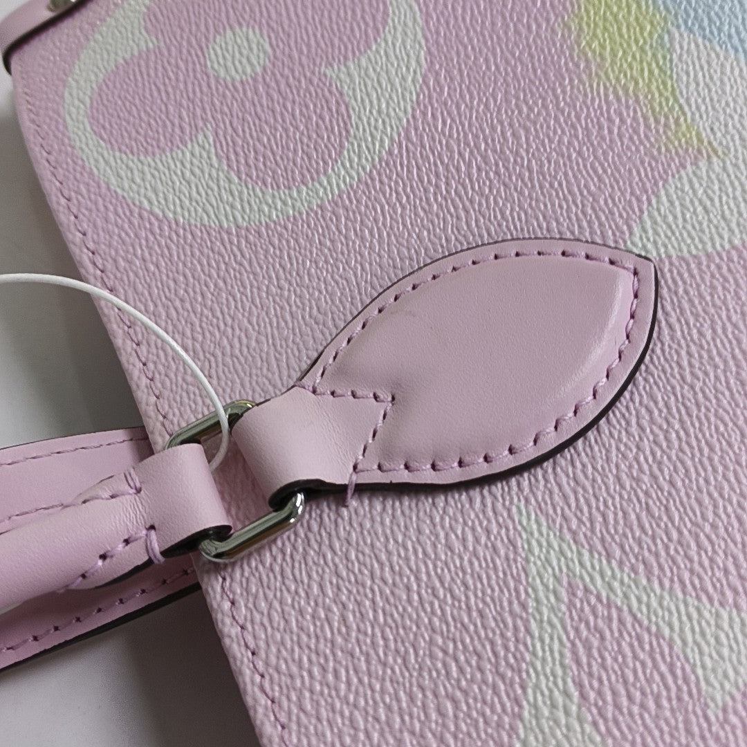 ONTHEGO GM Monogram Coated Canvas Pink