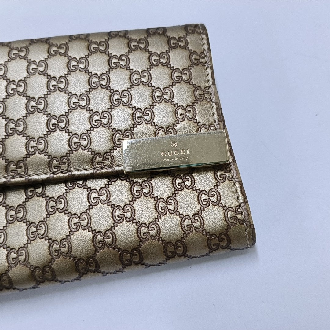 Authenticated pre-owned  Microguccissima Monogram Calfskin Brown Wallet - Wallet at Looply