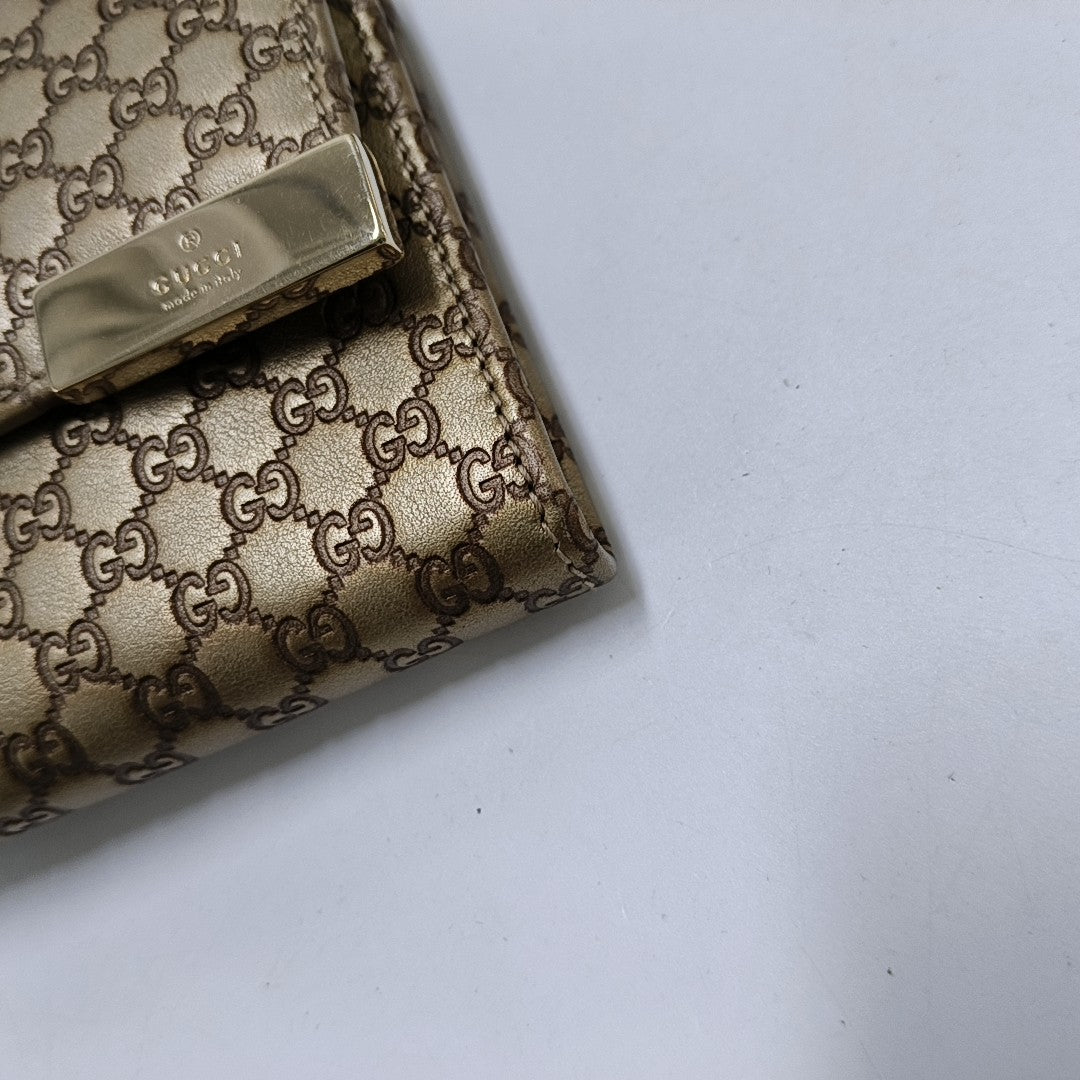 Authenticated pre-owned  Microguccissima Monogram Calfskin Brown Wallet - Wallet at Looply