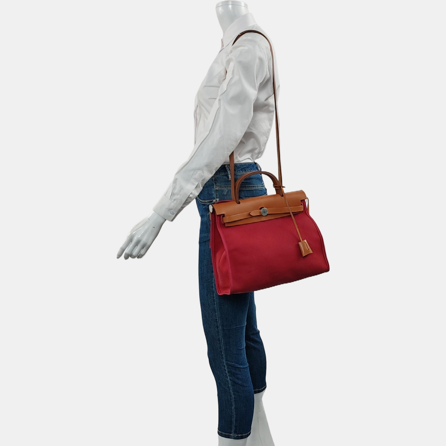 Authenticated pre-owned  Herbag 31 Canvas Red - Handbags at Looply