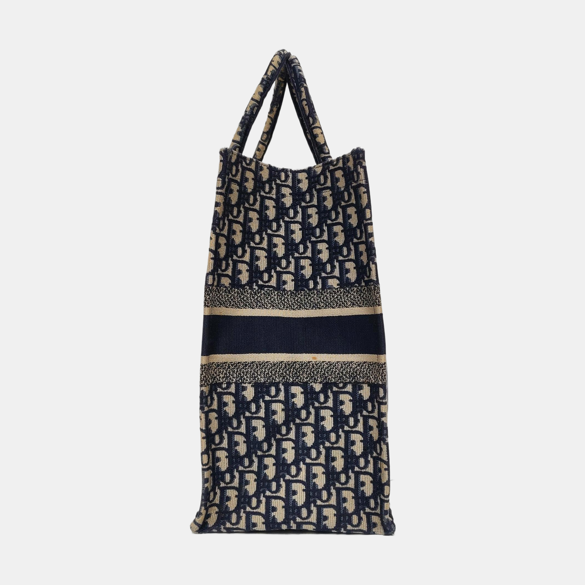 Authenticated pre-owned  Book Tote Large Monogram Canvas Blue - Top Handle Bag at Looply