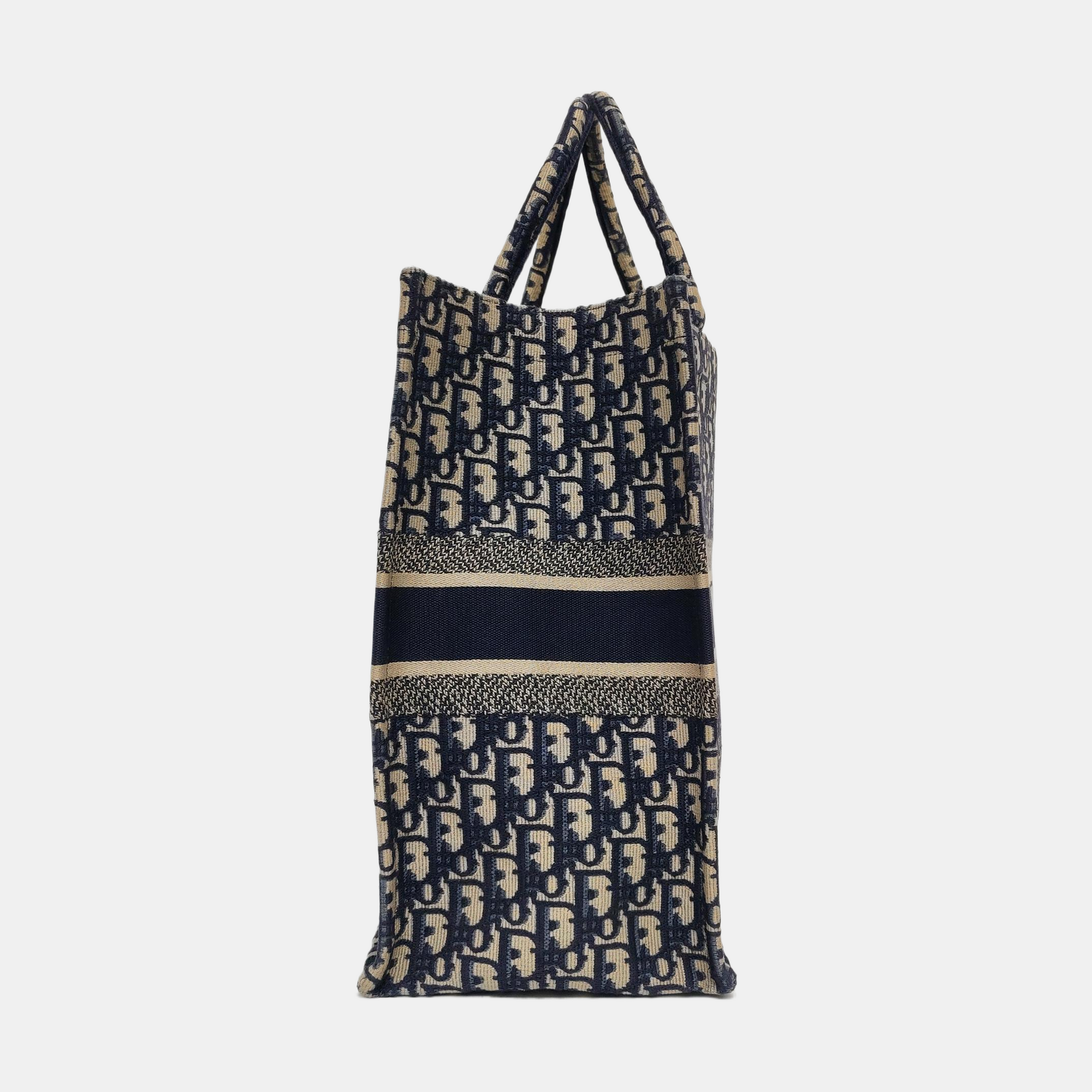 Authenticated pre-owned  Book Tote Large Monogram Canvas Blue - Top Handle Bag at Looply