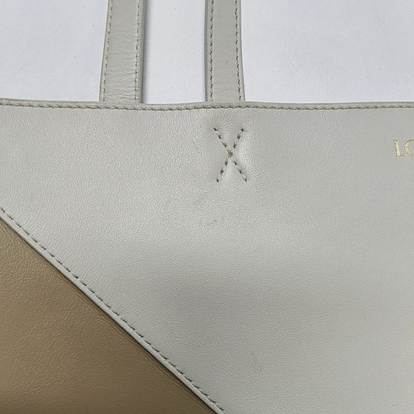 Authenticated pre-owned  Puzzle Fold Medium Calfskin Beige - Shoulder Bag at Looply