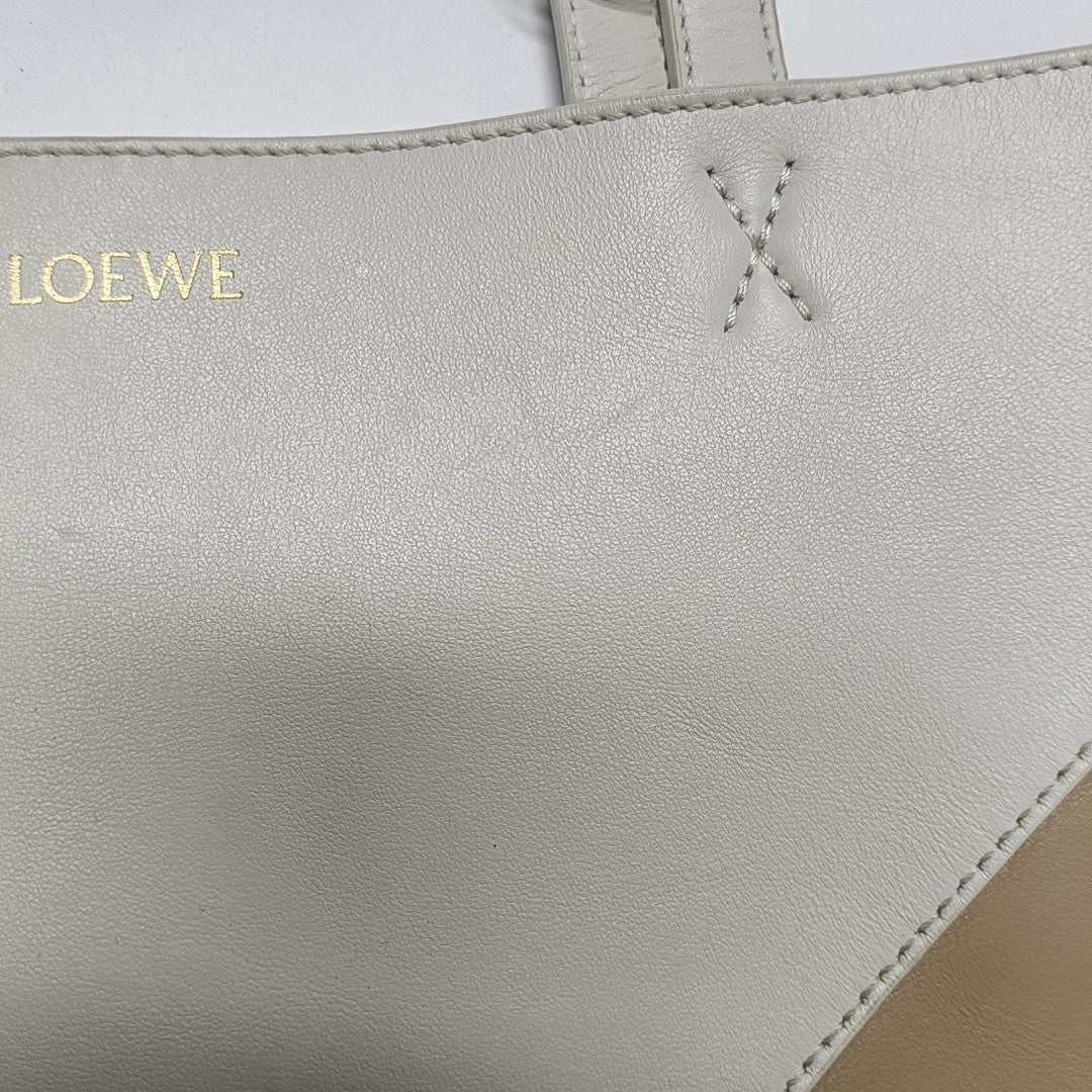 Authenticated pre-owned  Puzzle Fold Medium Calfskin Beige - Shoulder Bag at Looply