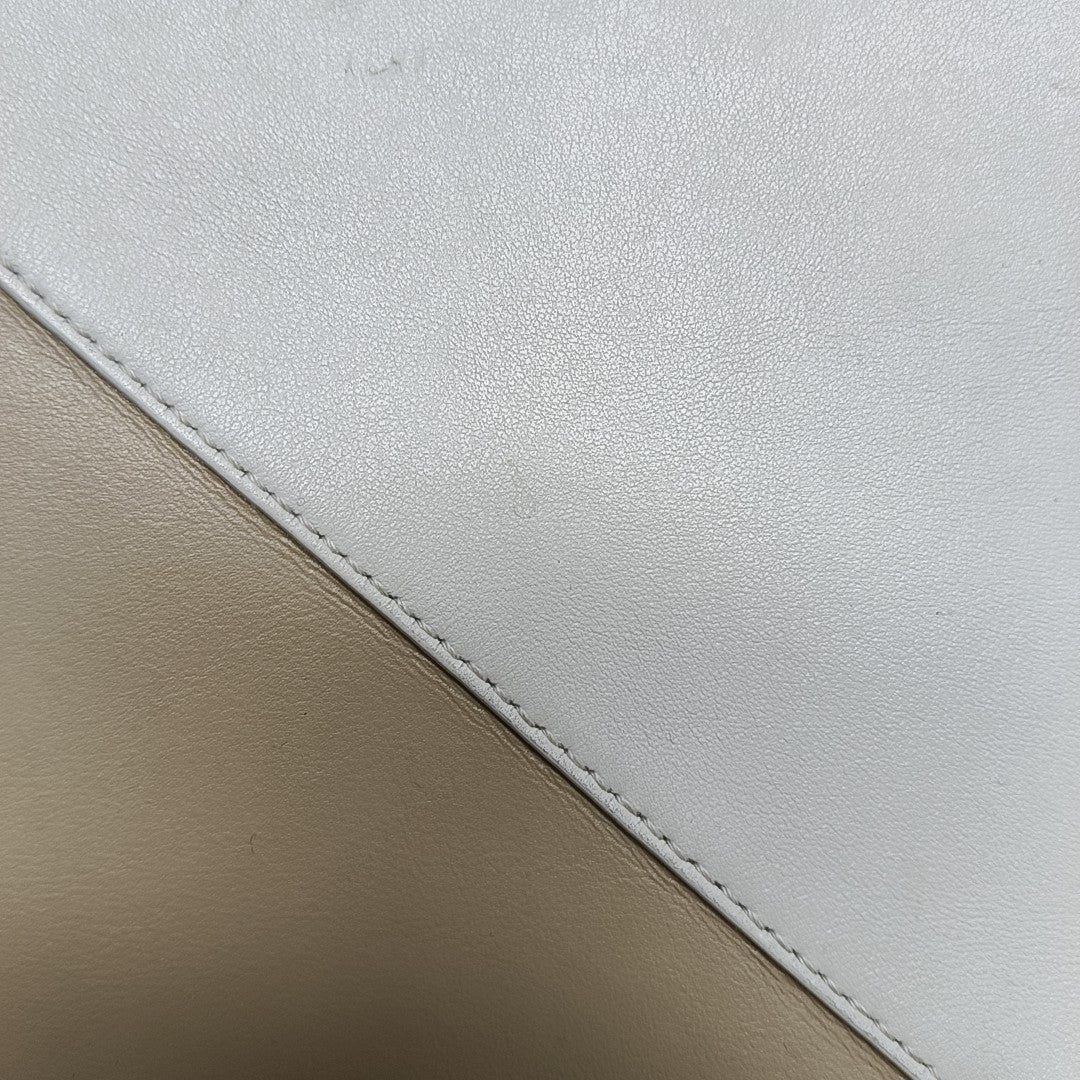 Authenticated pre-owned  Puzzle Fold Medium Calfskin Beige - Shoulder Bag at Looply