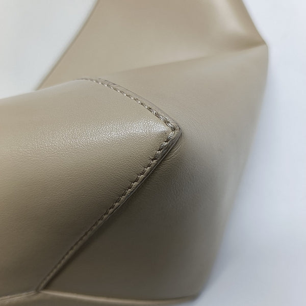 Authenticated pre-owned  Puzzle Fold Medium Calfskin Beige - Shoulder Bag at Looply