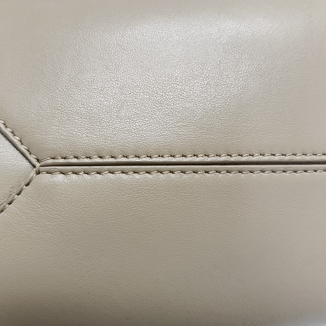 Authenticated pre-owned  Puzzle Fold Medium Calfskin Beige - Shoulder Bag at Looply