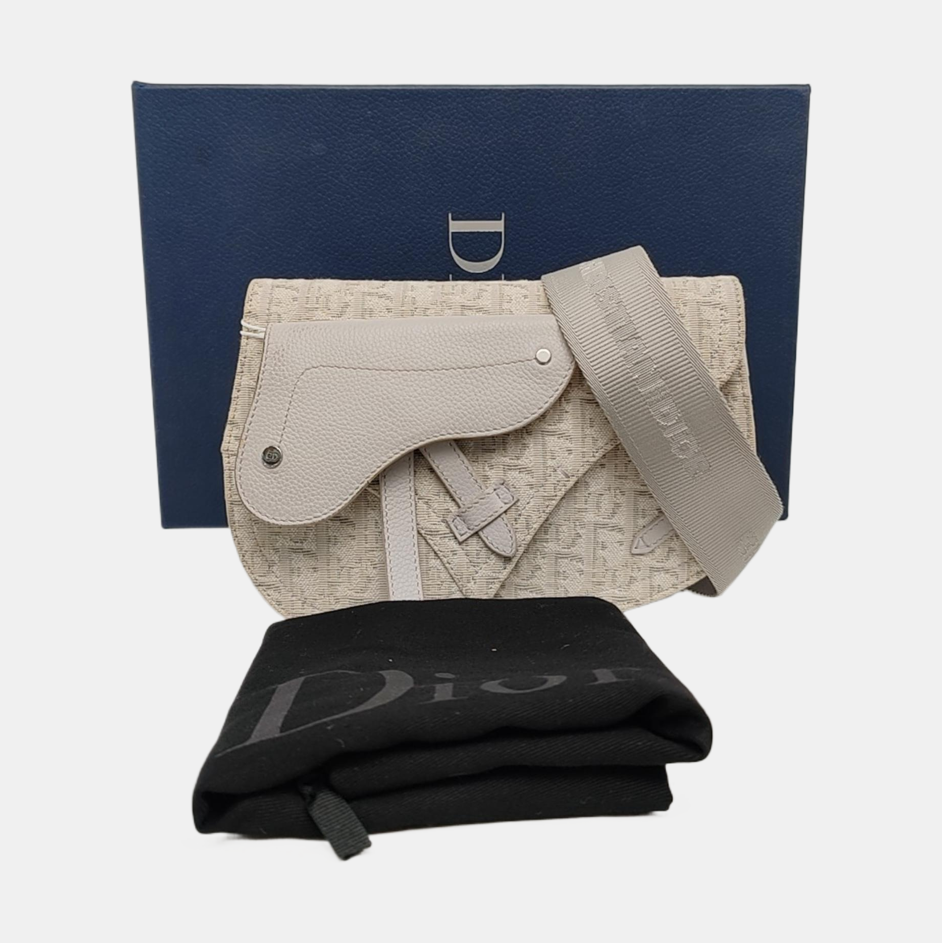 Authenticated pre-owned  Saddle Oblique Canvas Beige - Crossbody Bag at Looply