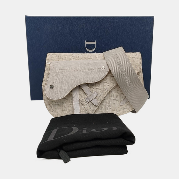 Authenticated pre-owned  Saddle Oblique Canvas Beige - Crossbody Bag at Looply