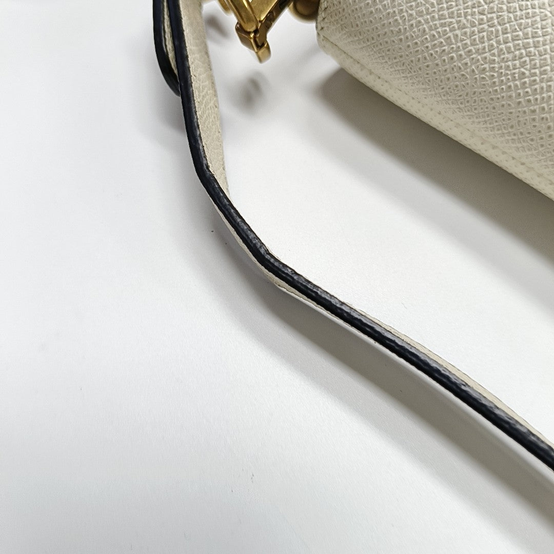 Authenticated pre-owned  Saddle Mini Calfskin White - Top Handle Bag at Looply