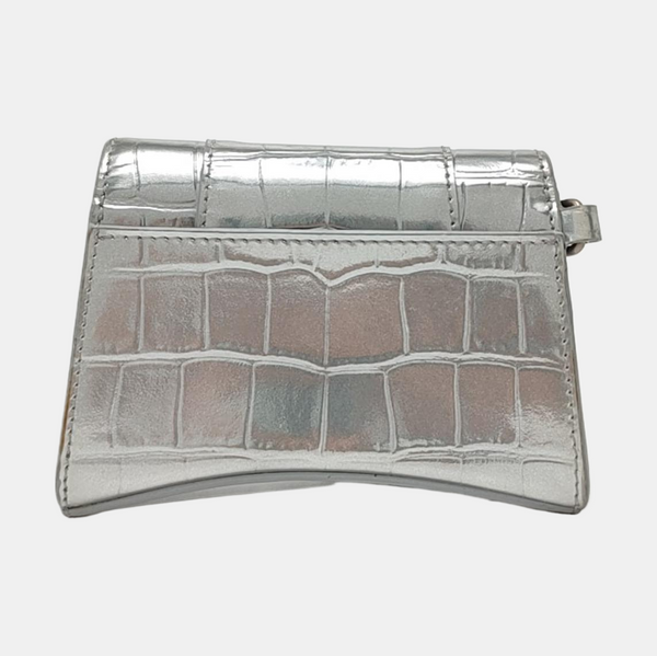 Authenticated pre-owned  Hourglass Calfskin Silver - Clutch at Looply
