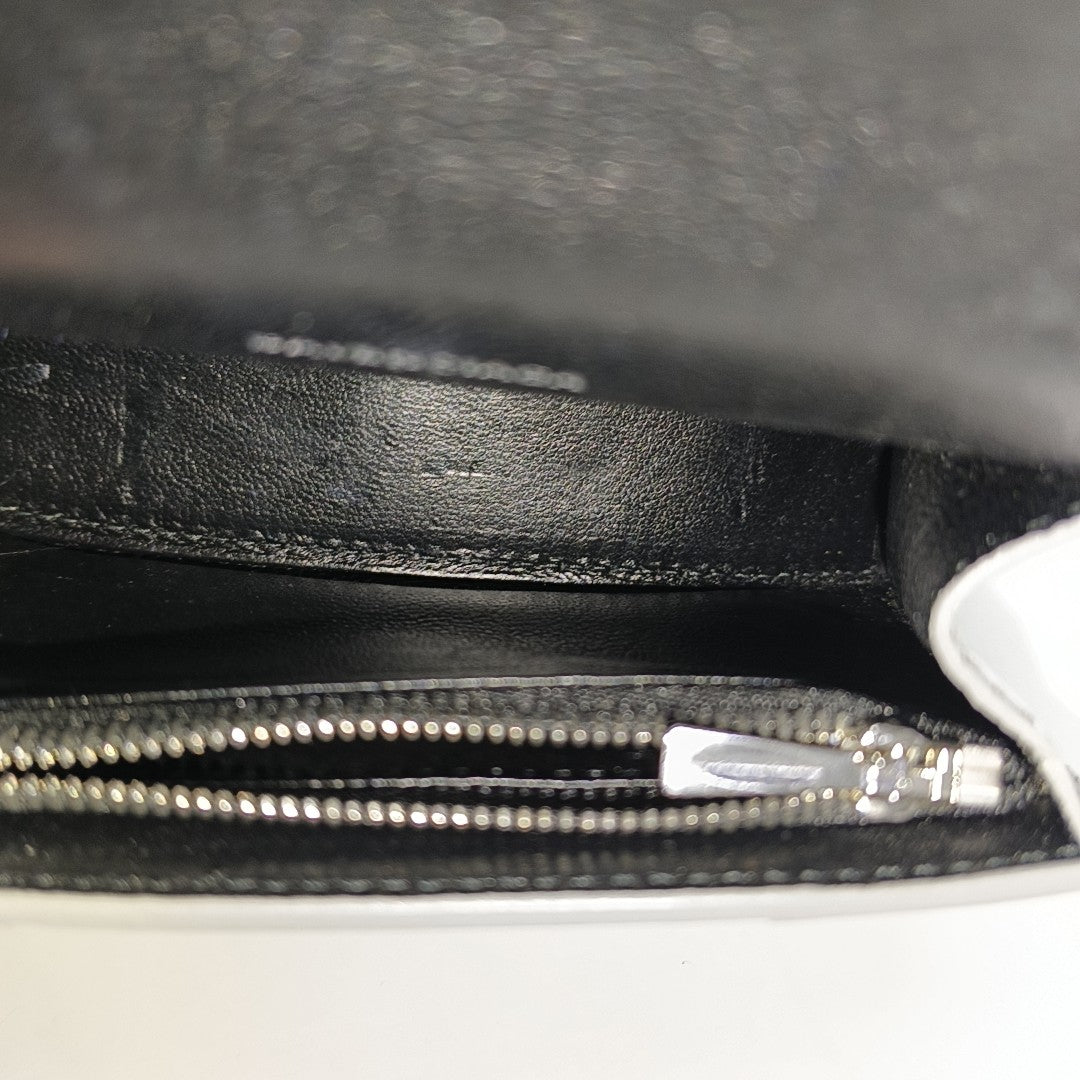 Authenticated pre-owned  Hourglass Calfskin Silver - Clutch at Looply
