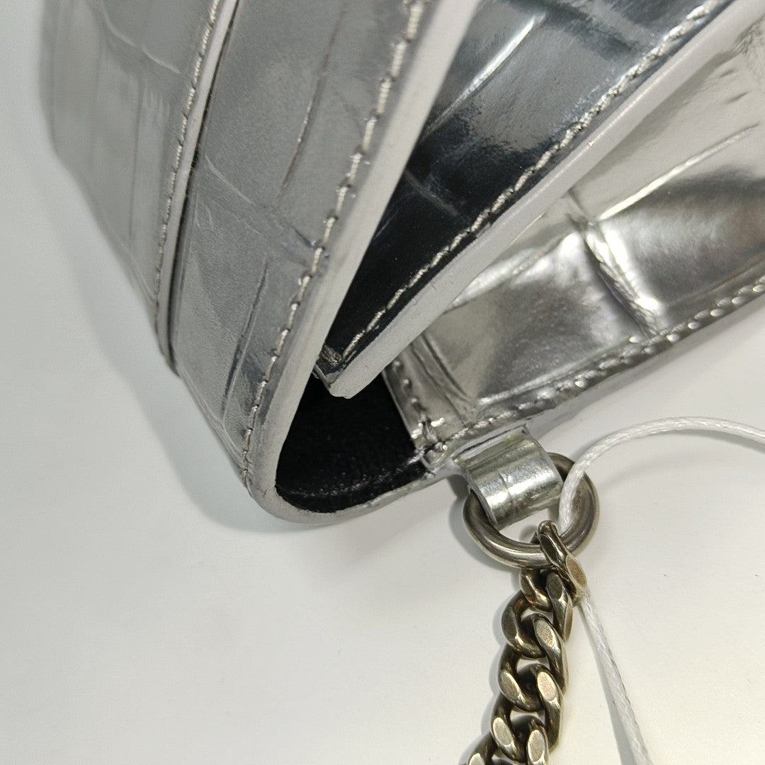 Authenticated pre-owned  Hourglass Calfskin Silver - Clutch at Looply